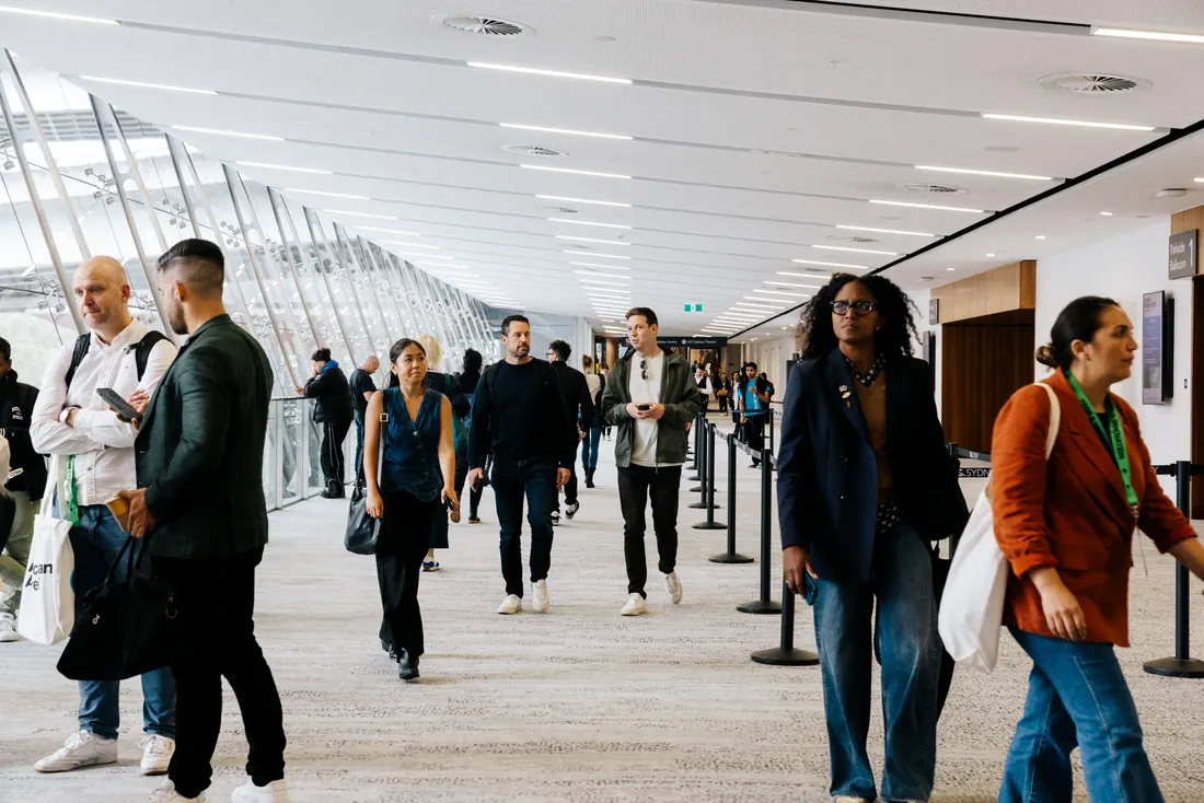 Attendees moving through a major event venue
